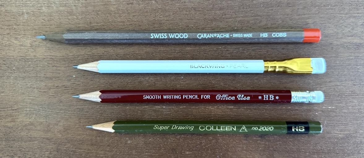 A photograph of the four pencils.
