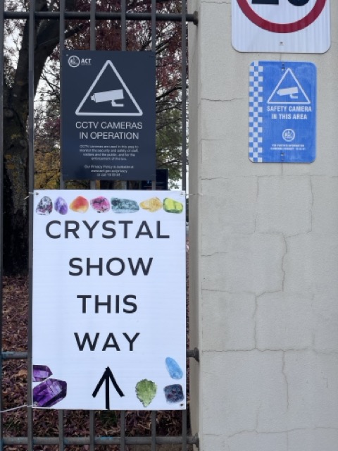 Photo: a printed sign for the 'crystal show'.