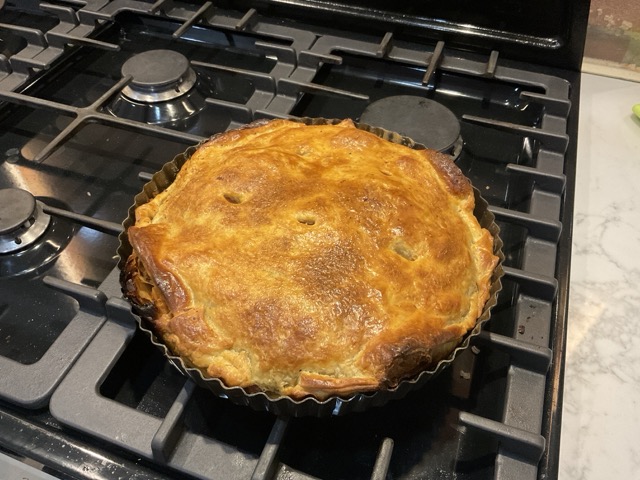 A photo of a cooked pie.